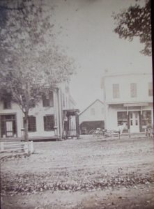 Central Hotel, Livery Stable, and Chester Drug Store.