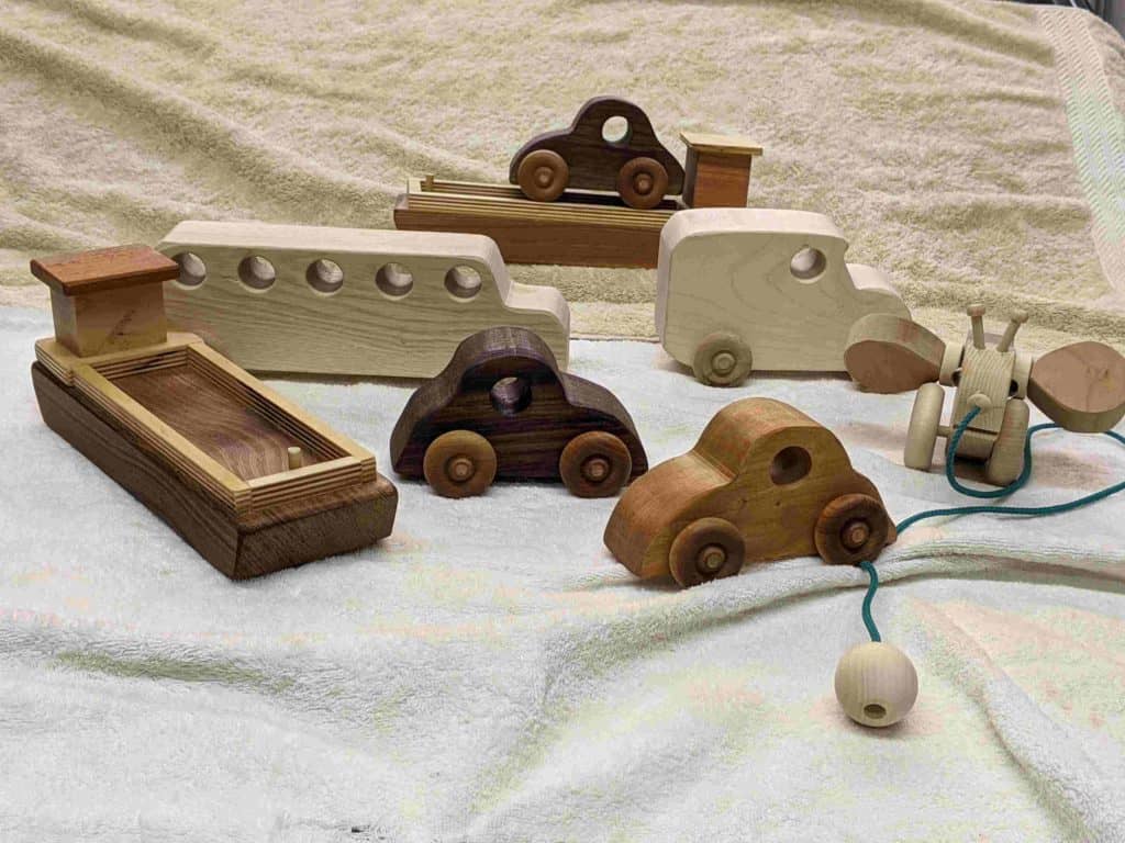 Wooden toys designed by creative director Robert Stocker with Tesla Rocker Racer designed by Gerry DeMuro