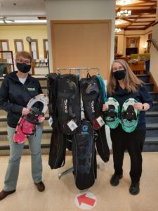 Laura L. Jensen, lifestyle medicine program coordinator and program Manager of RiseVT Windsor County, and library director Sue Dowdell show off the library’s new snowshoes.