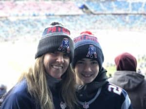 Kristin Baker, nurse at UVMMC, and her son Zack at his first Pats game