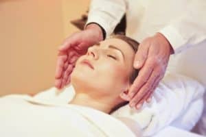 Learn how reiki can aid your health and healing. Stock photo