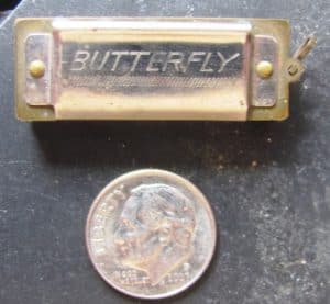 Butterfly harmonica Alton played. Notice the dime for scale