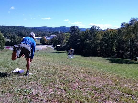 Disc golfer putting on hole 6 at Chester Disc Golf Course. Photo provided