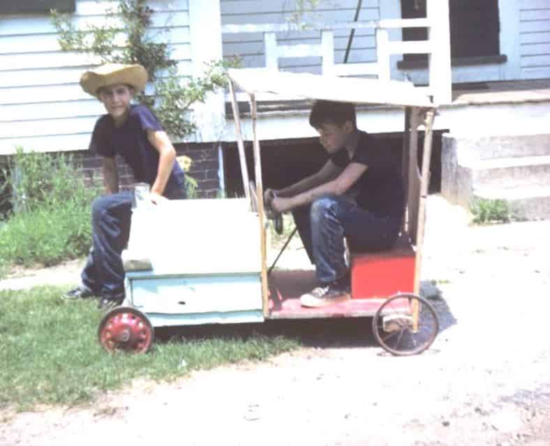 Lee, left, and his brother Pete driving their homemade buggy 1948