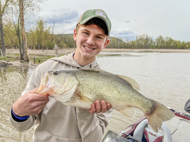 Warmer weather, minimal boat traffic, and increased feeding activity by largemouth and smallmouth bass will offer great opportunity for fast catch-and-release fishing action. Photo by Shawn Good, Vermont Fish & Wildlife