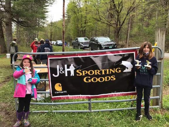 Sophia Mylott, left, with her historic biggest fish catch, and Audrey Merritt, winner for first and most fish caught in their age group, at the Saxtons River Rec Area fishing derby.