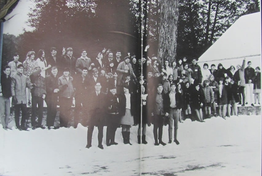 Class of 1969 at the wall. Hearse House on the right. Photo provided