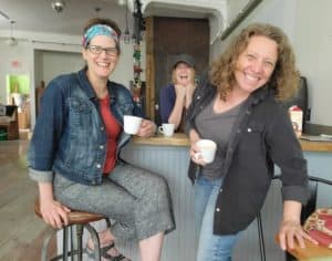 Larisa Demos, Bri Johnson, and Jana Bryan, founding members of The Flat Iron Cooperative on the Square in Bellows Falls. Photo provided
