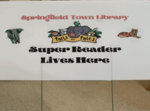 Springfield Town Library yard sign: "Super Reader Lives Here"