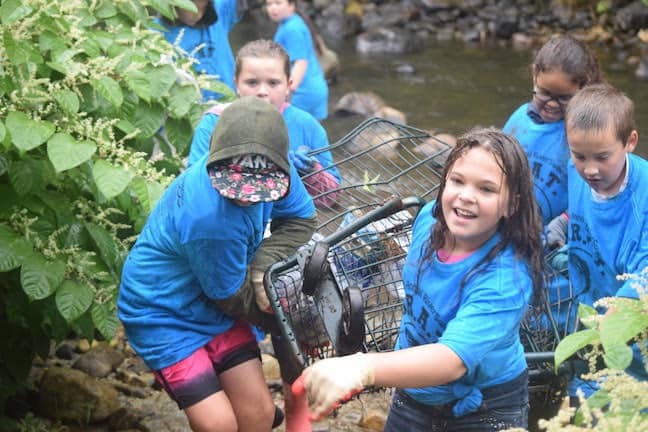 Ludlow Elementary School students cleaning up the Black River