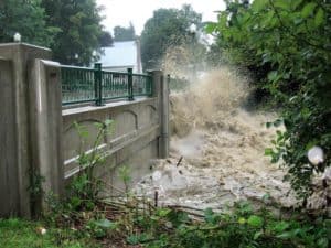 Aftermath of Irene: High waters crashing against Saxtons River Bridge, August 2011. Photo by Louise Luring