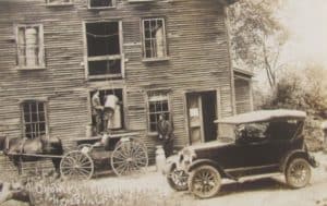 A farmer delivery his milk to Crowley's