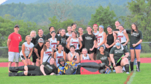 The Cardinals and Cosmos pose for a group photo after a spirited scrimmage on Thursday at Monadnock Park. Photo by Christopher Shaban, Eagle Times