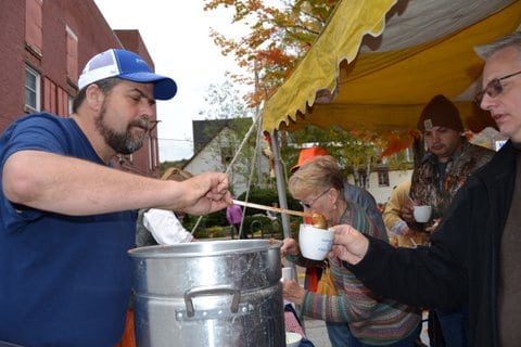 Chris Saylor, a past award-winner, serves chili at the 2019 Ludlow Rotary Chili Cook-Off