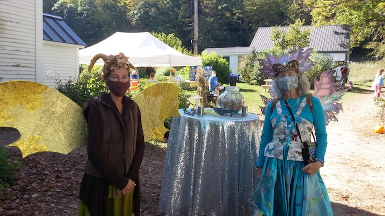 Fairy Queens former Director Vanessa Stern and current Board Chair Lorie Danforth welcoming visitors to this year’s Fairy House Festival