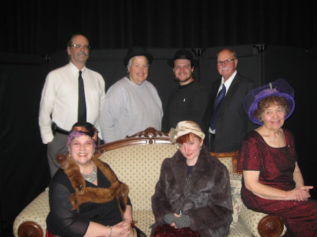 Cast members of “It’s a Wonderful Life,” front: April Lawrence as Mary Bailey, Maia Gilmour as Violet, and Irene Ramen as Mrs. Bailey; back: Tom Field as Mr. Potter, Paul Faenza as Clarence, Tuckerman Wunderle as George Bailey, and Don Gray as Uncle Billy. Photo provided