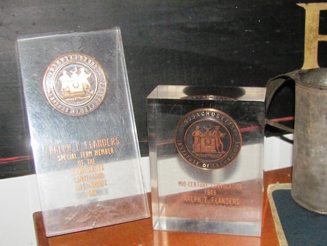 Two bronze MIT awards. Photo by Ron Patch