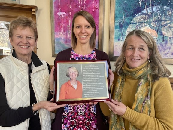 Whiting Library Director Deirdre Dorn (center) and Kathy Pellett (left) and Heather Chase (right), of the Suzy Forlie Memorial Committee
