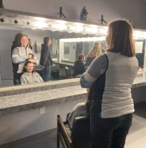 Kurn Hattin Homes’ students get ready for their close-ups in the dressing room backstage at the Colonial Theatre. Photo provided